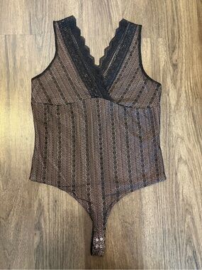 New XL Dynamite bodysuit
